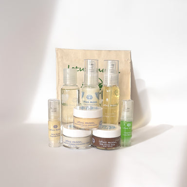 Lotus Moon Flake-Free 8-Piece Mini Skincare Bundle featuring travel-size cleansers, exfoliants, serums, and moisturizer